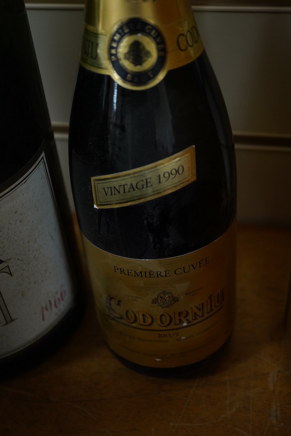 Eight bottles of champagne, including a jeroboam of Bollinger 1966 (poor level - mid body) six bottles of Dom Perignon to include 1964, 1966, 1971, 1980 and 1982 (2) and a Codorniu, 1990